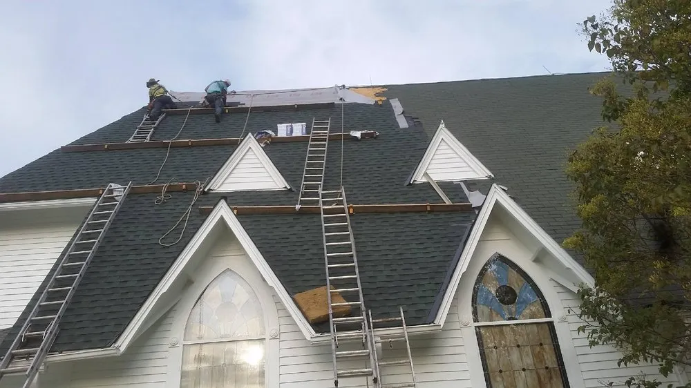 Slide of Arroyo's Roofing & Construction