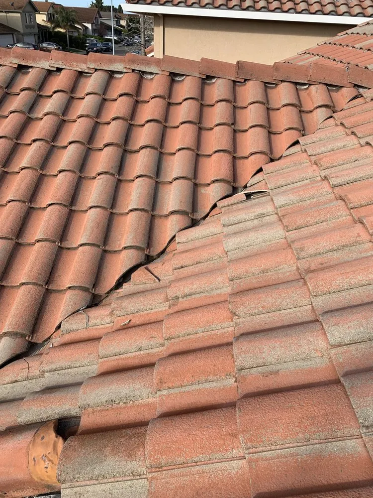 Slide of Arsenal Roofing Services