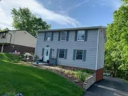 Slide of Art Dollman Home Improvements