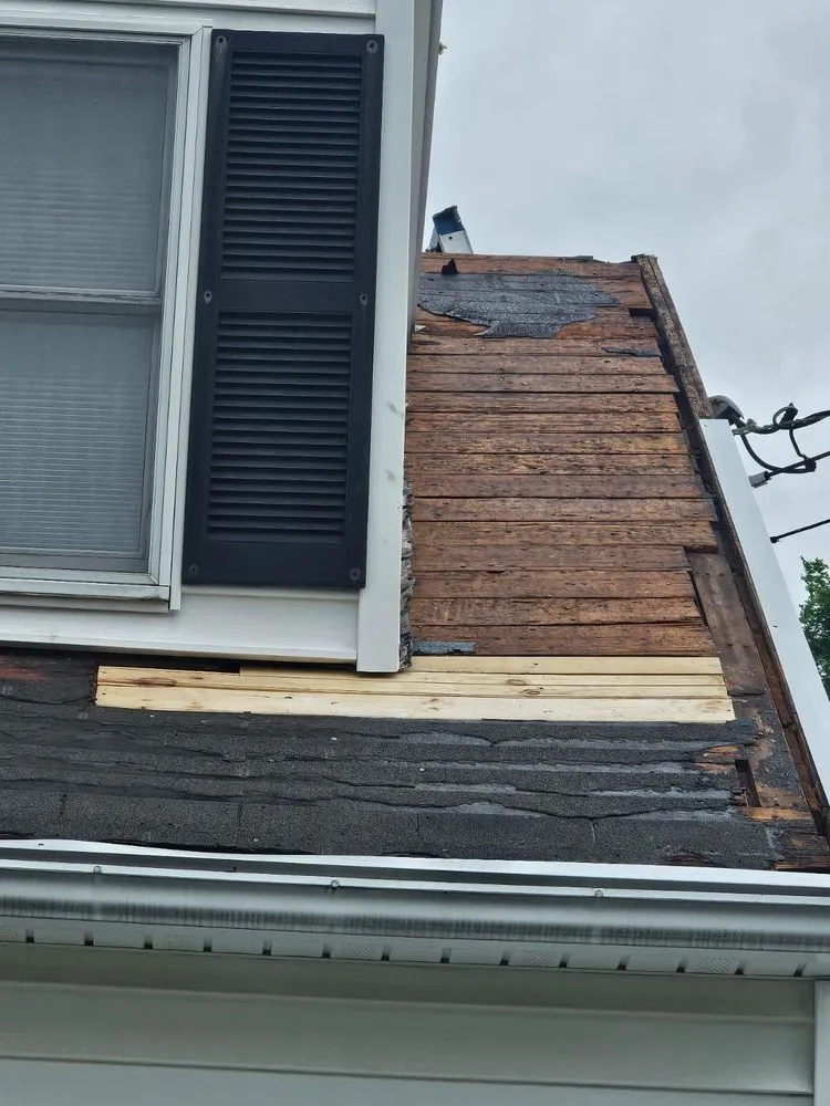 Slide of Art Roofing