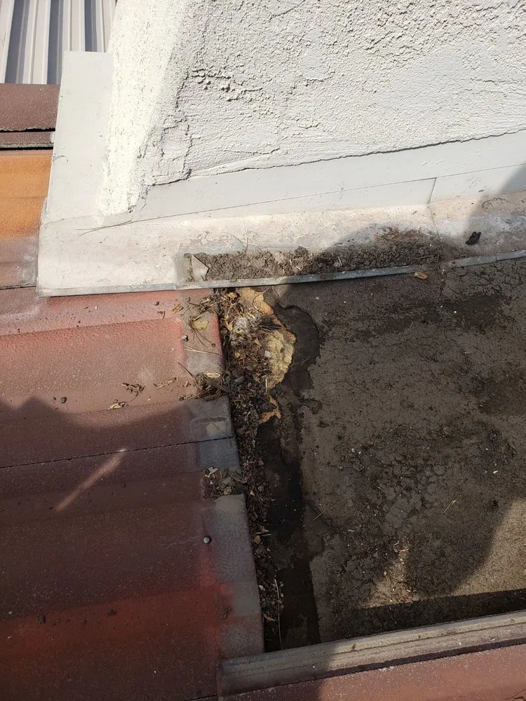 Slide of Art Roofing Plus