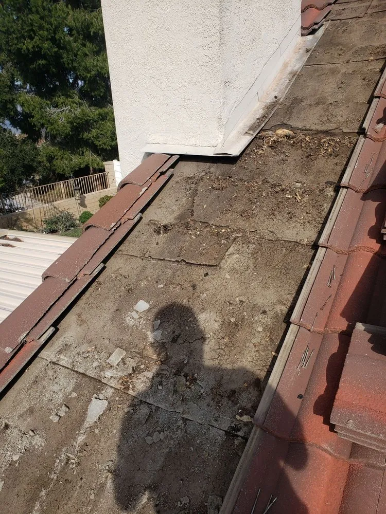 Slide of Art Roofing Plus