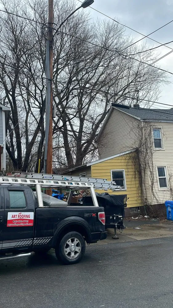 Slide of Art Roofing