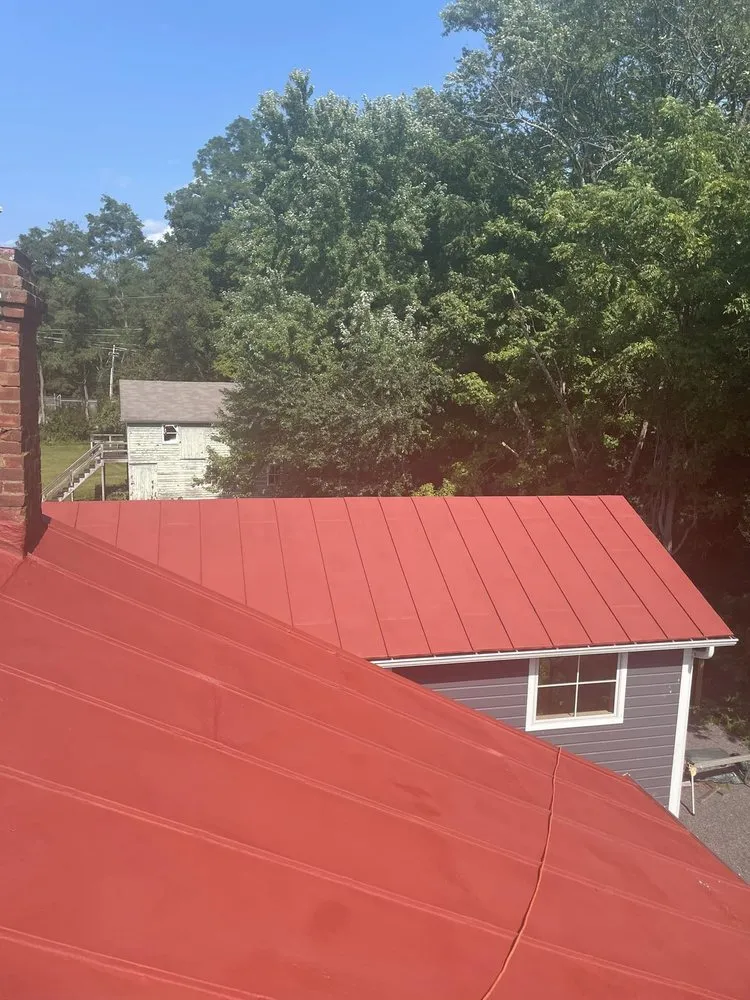 Slide of Art Roofing