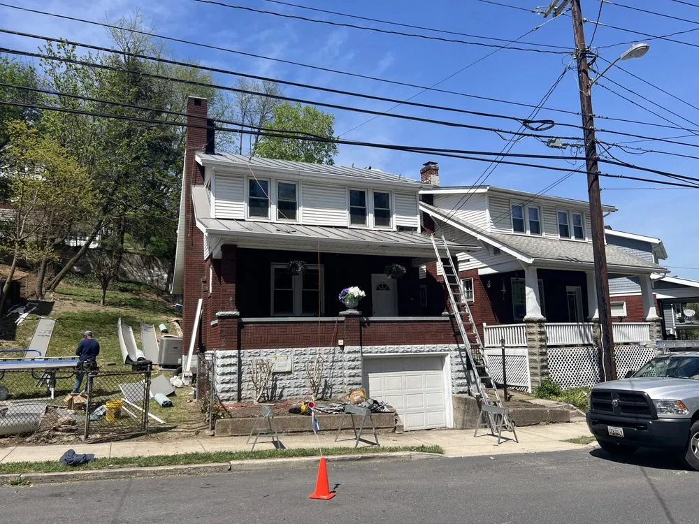 Slide of Art Stone Exteriors & Renovations