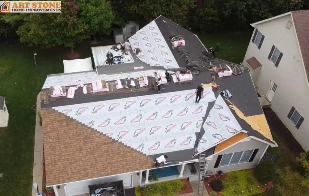 Slide of Art Stone Exteriors & Renovations