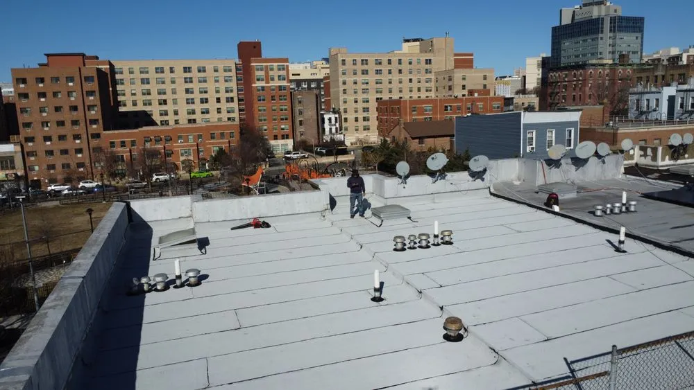 Slide of ARTE Roofing & Contracting