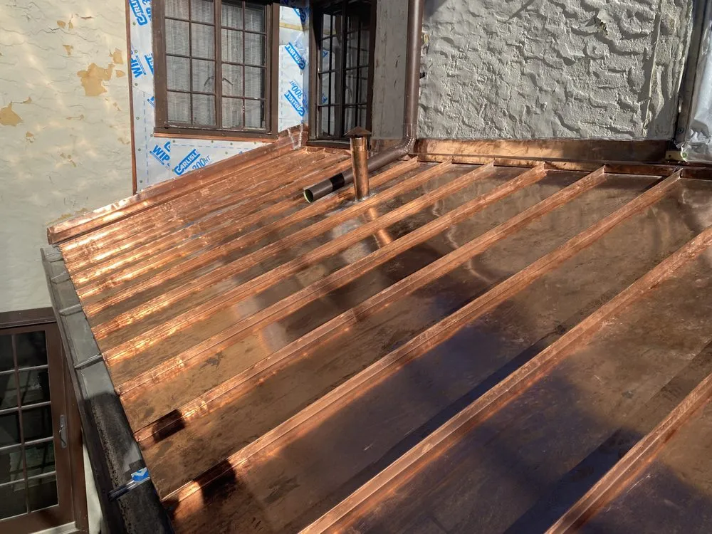 Slide of ARTE Roofing & Contracting