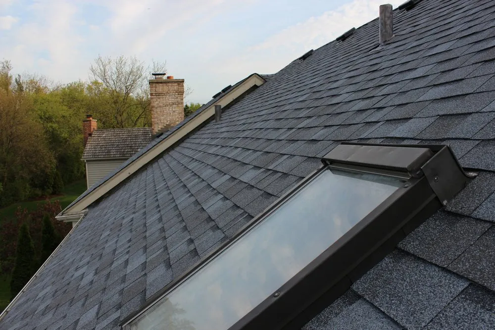 Slide of Artex Roofing