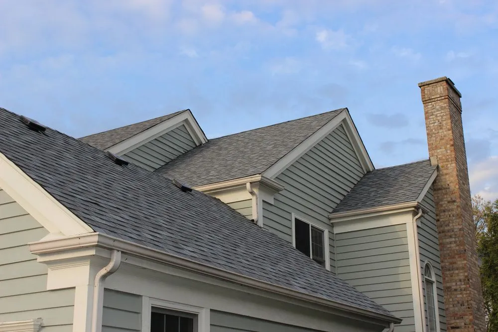 Slide of Artex Roofing