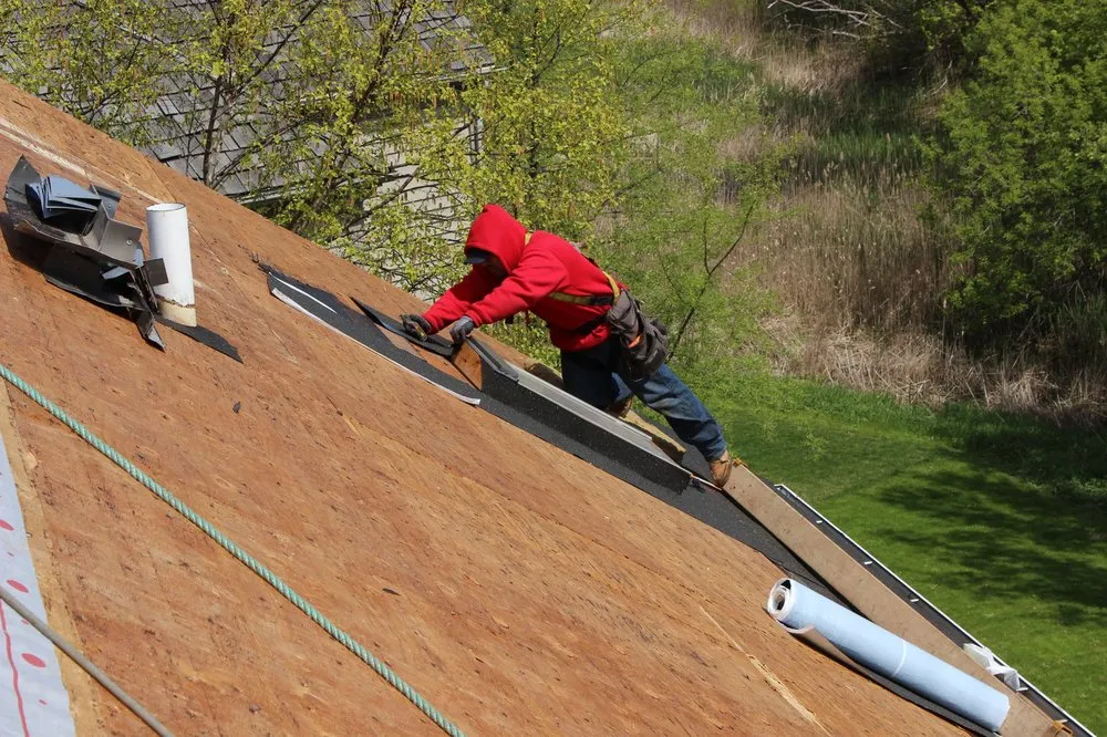 Slide of Artex Roofing