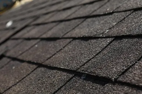 Slide of Artex Roofing