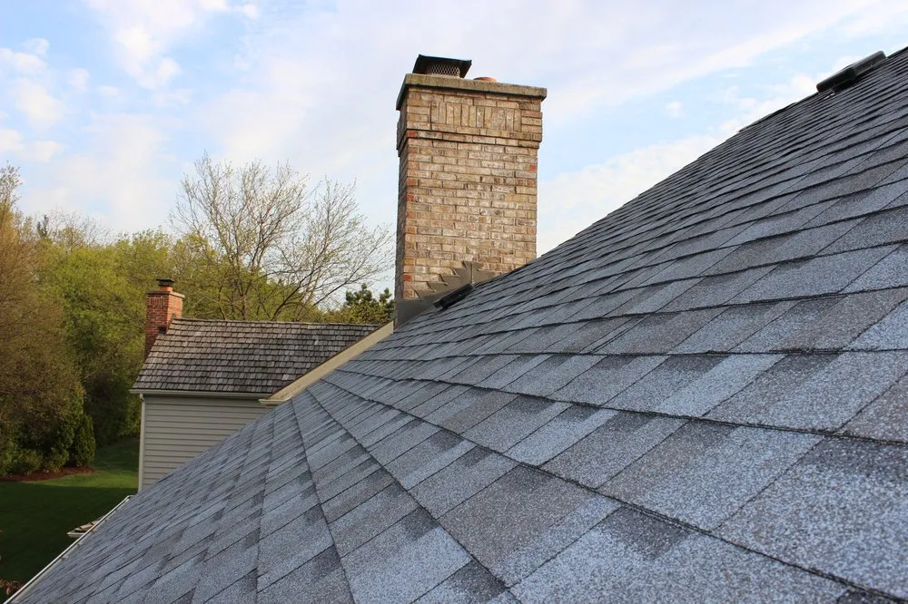 Slide of Artex Roofing