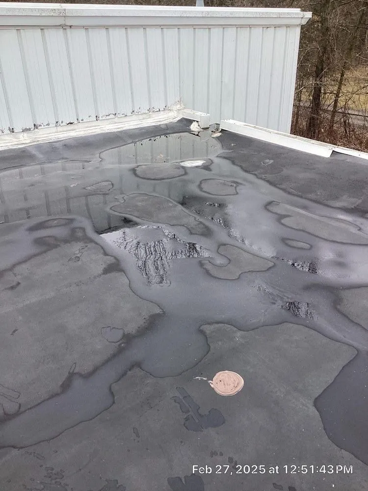 Slide of Arthur Roofing