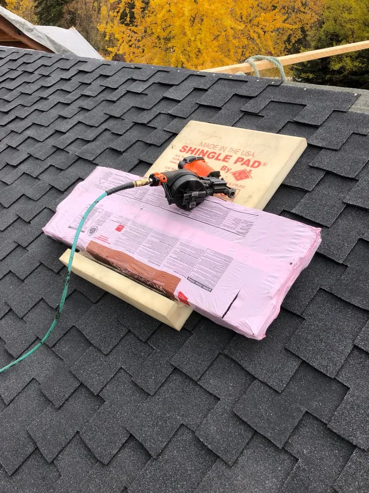 Slide of Artisan Roofing & Ice Dam Removal