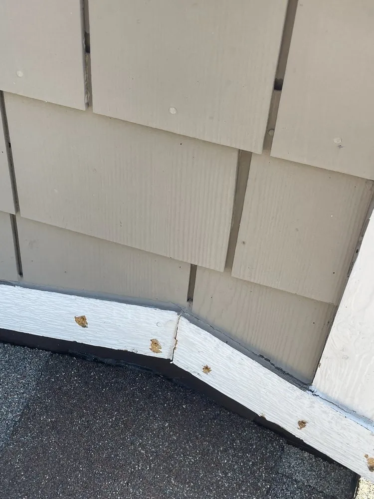 Slide of Artisan Roofing & Ice Dam Removal