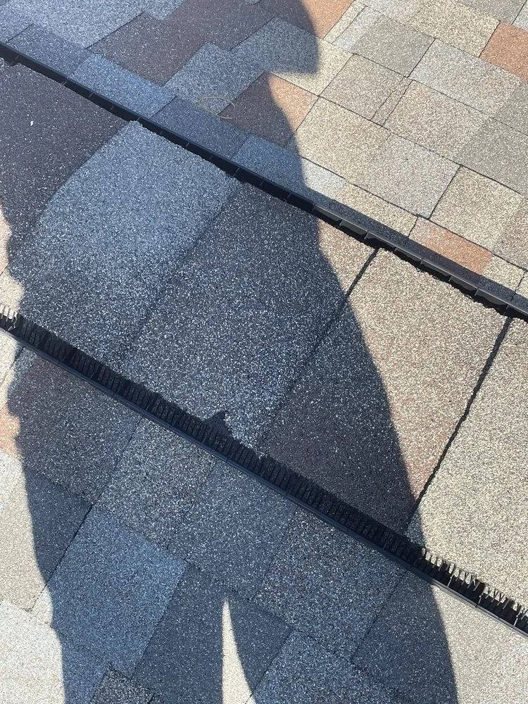 Slide of Artisan Roofing & Ice Dam Removal