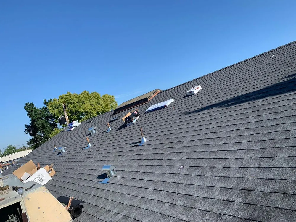 Slide of Art’s Roofing