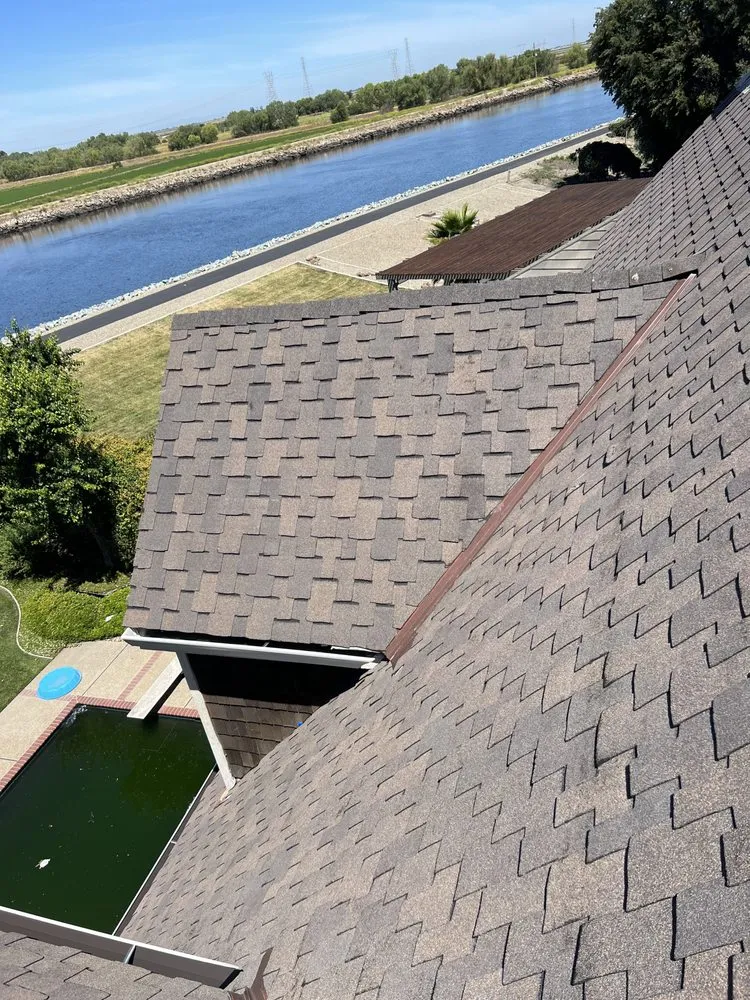 Slide of Art’s Roofing