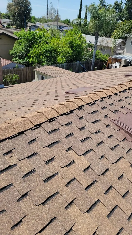 Slide of Art’s Roofing