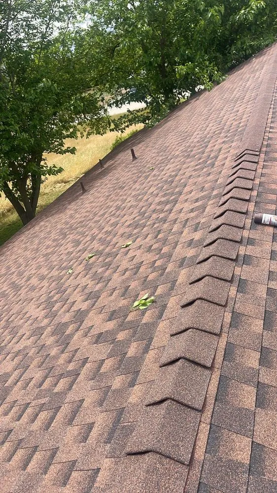 Slide of Art’s Roofing