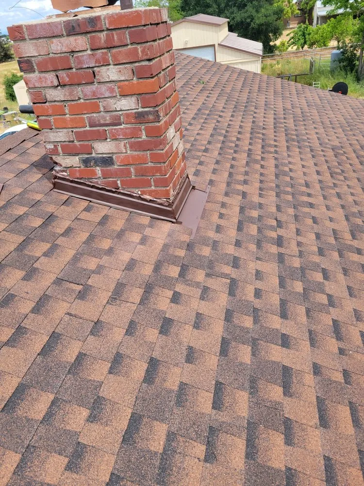 Slide of Art’s Roofing