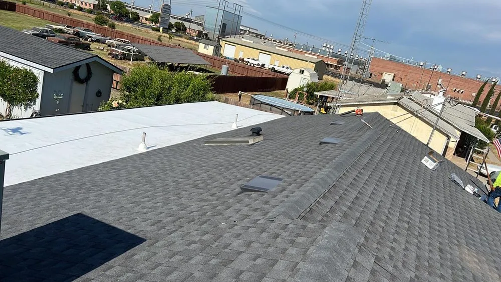 Slide of Art’s Roofing