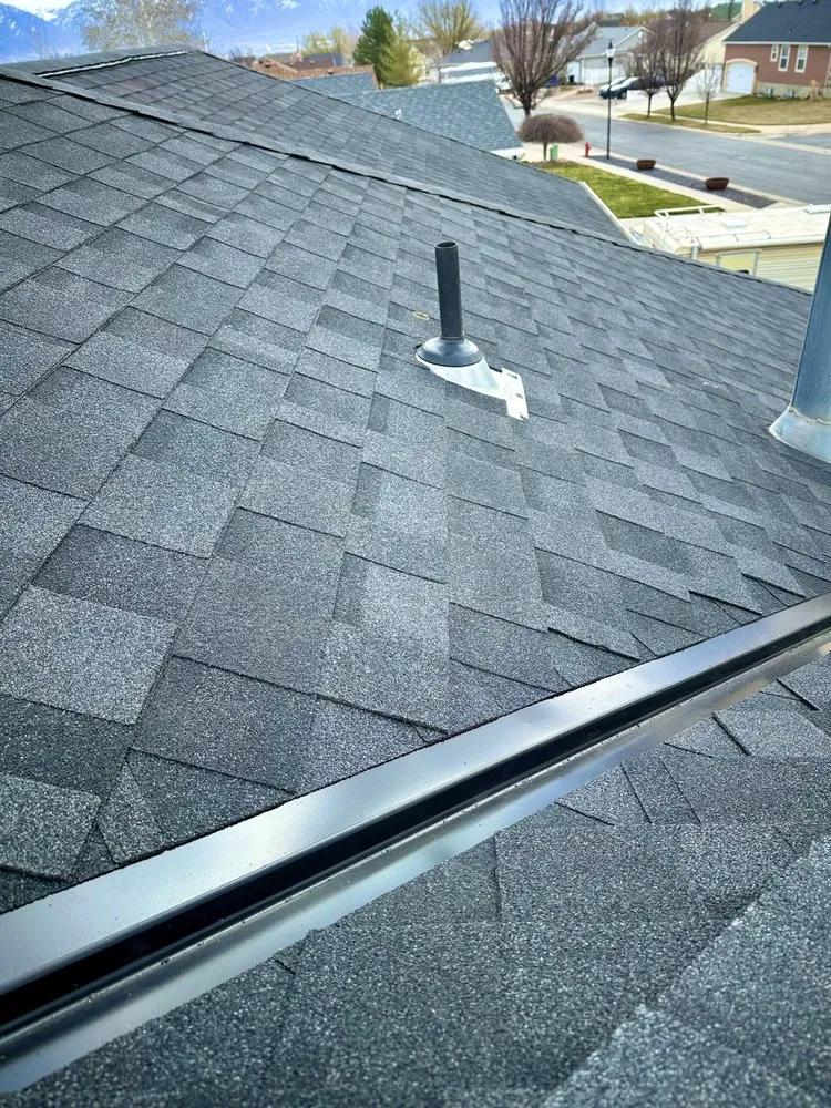 Slide of Arturos Roofing