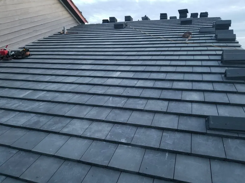 Slide of Arvada Roofing & Weather Proofing