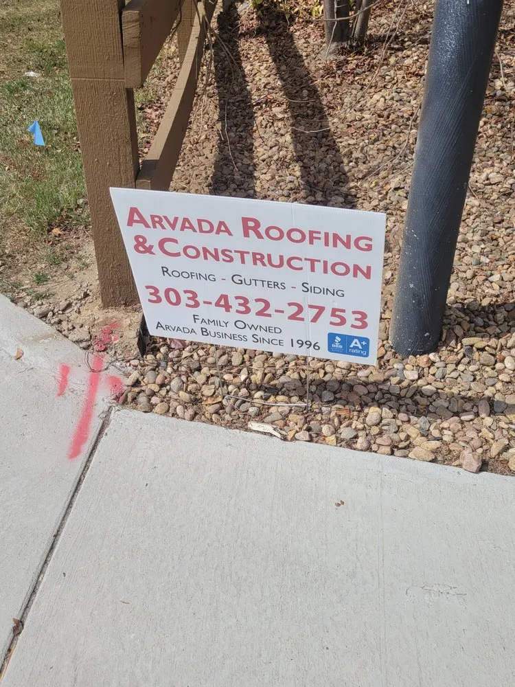 Slide of Arvada Roofing and Construction