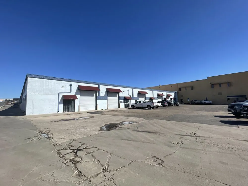 Slide of Arvada Roofing and Construction