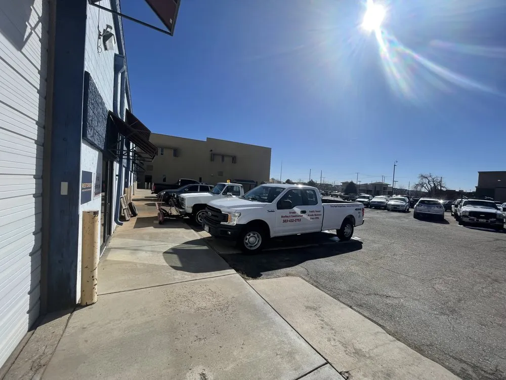 Slide of Arvada Roofing and Construction