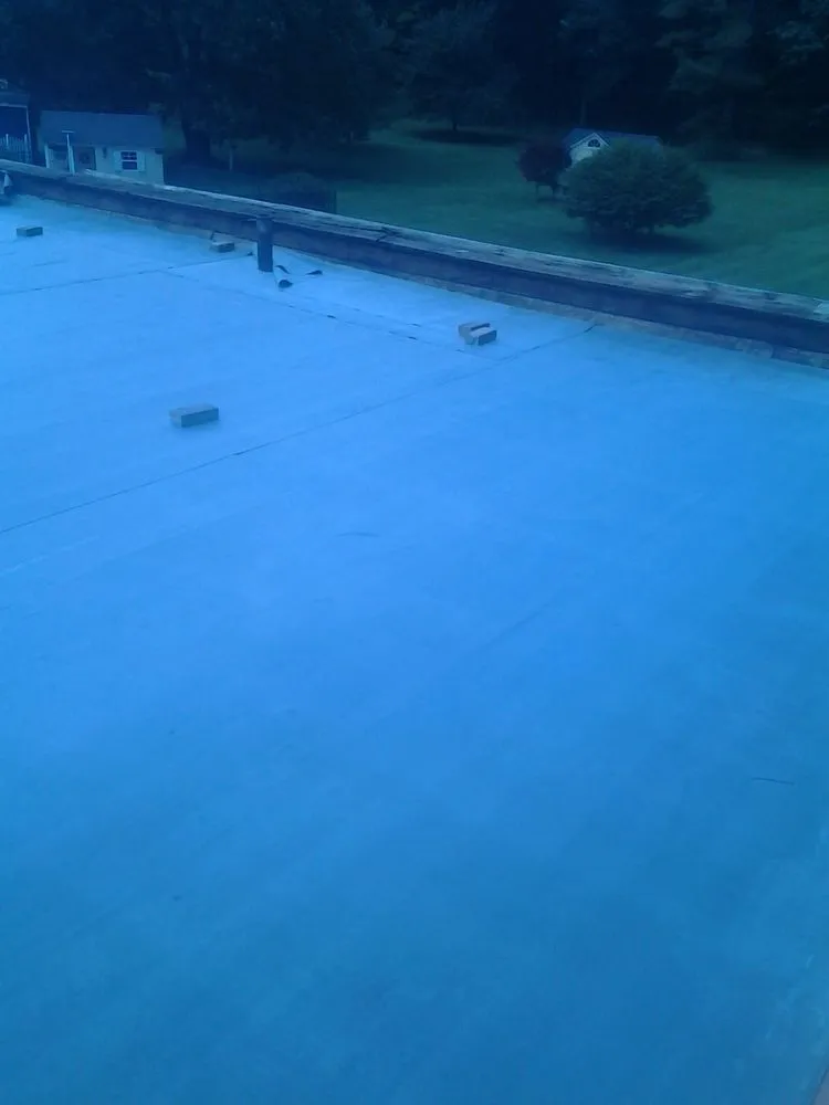 Professional flat roof repair for homes in New Milford, PA by AS Contracting