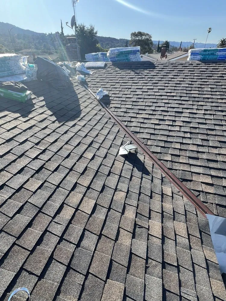 Slide of A’s Roofing