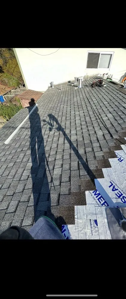 Slide of A’s Roofing