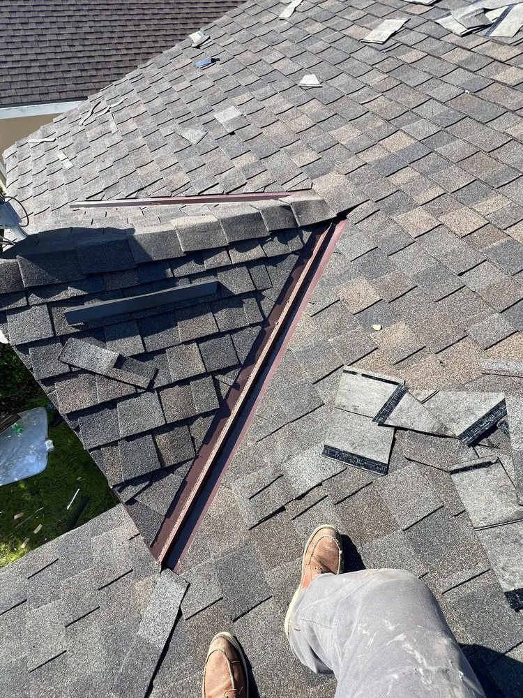 Slide of A’s Roofing