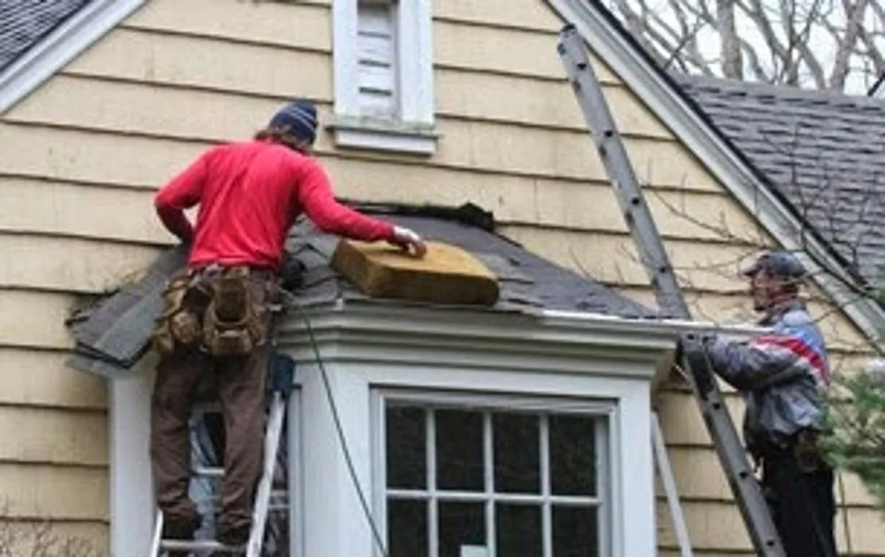 Slide of Ascend Roofing Company