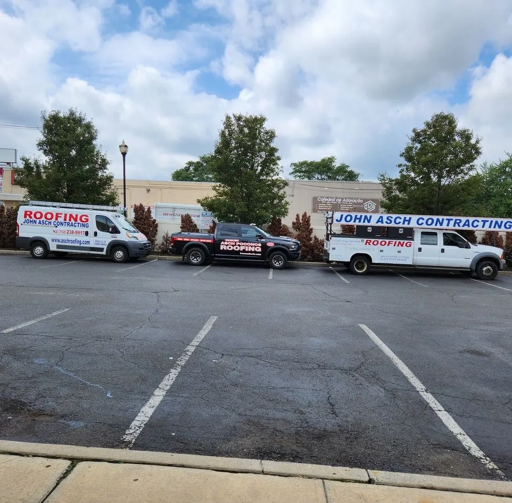 Slide of Asch Roofing