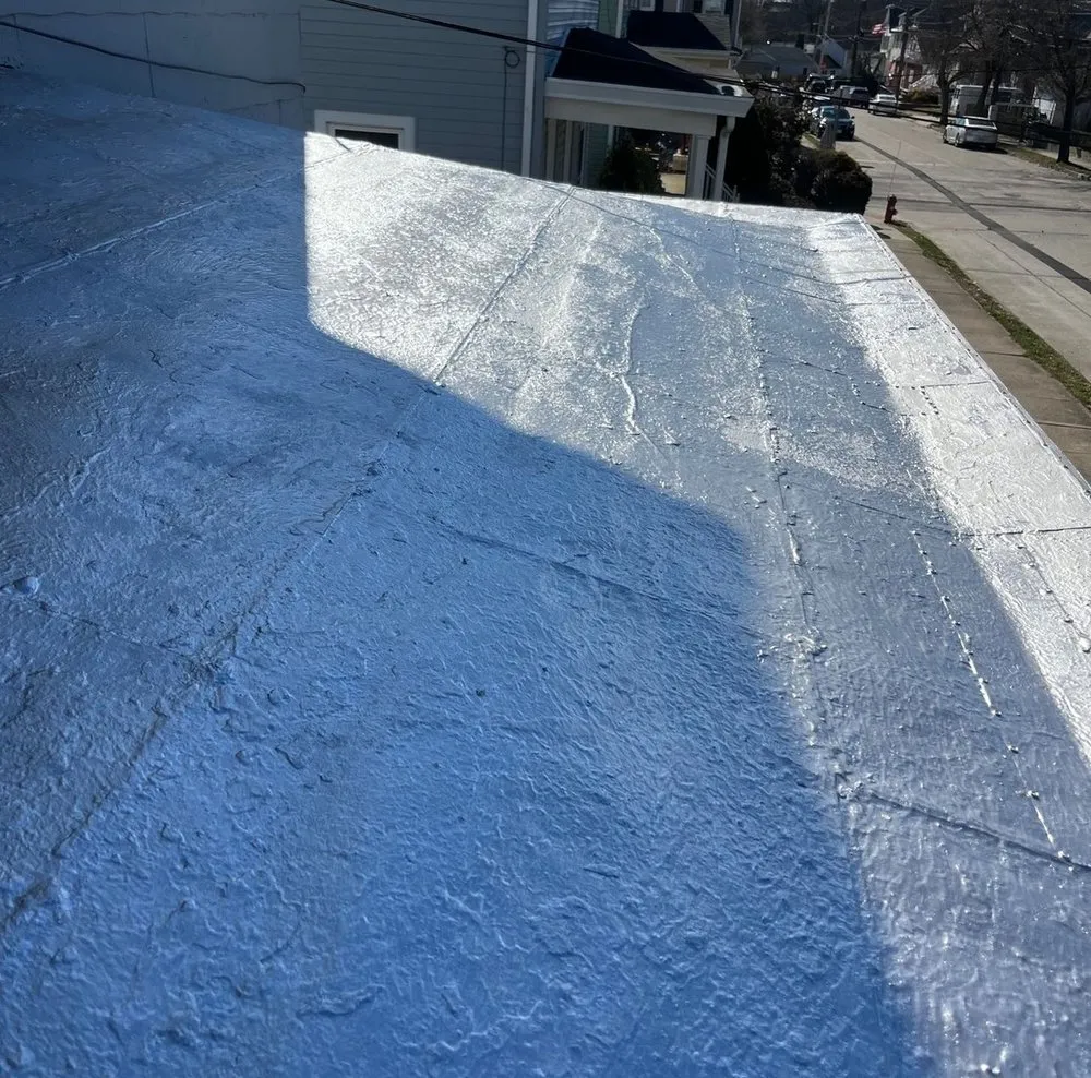 Slide of Asch Roofing