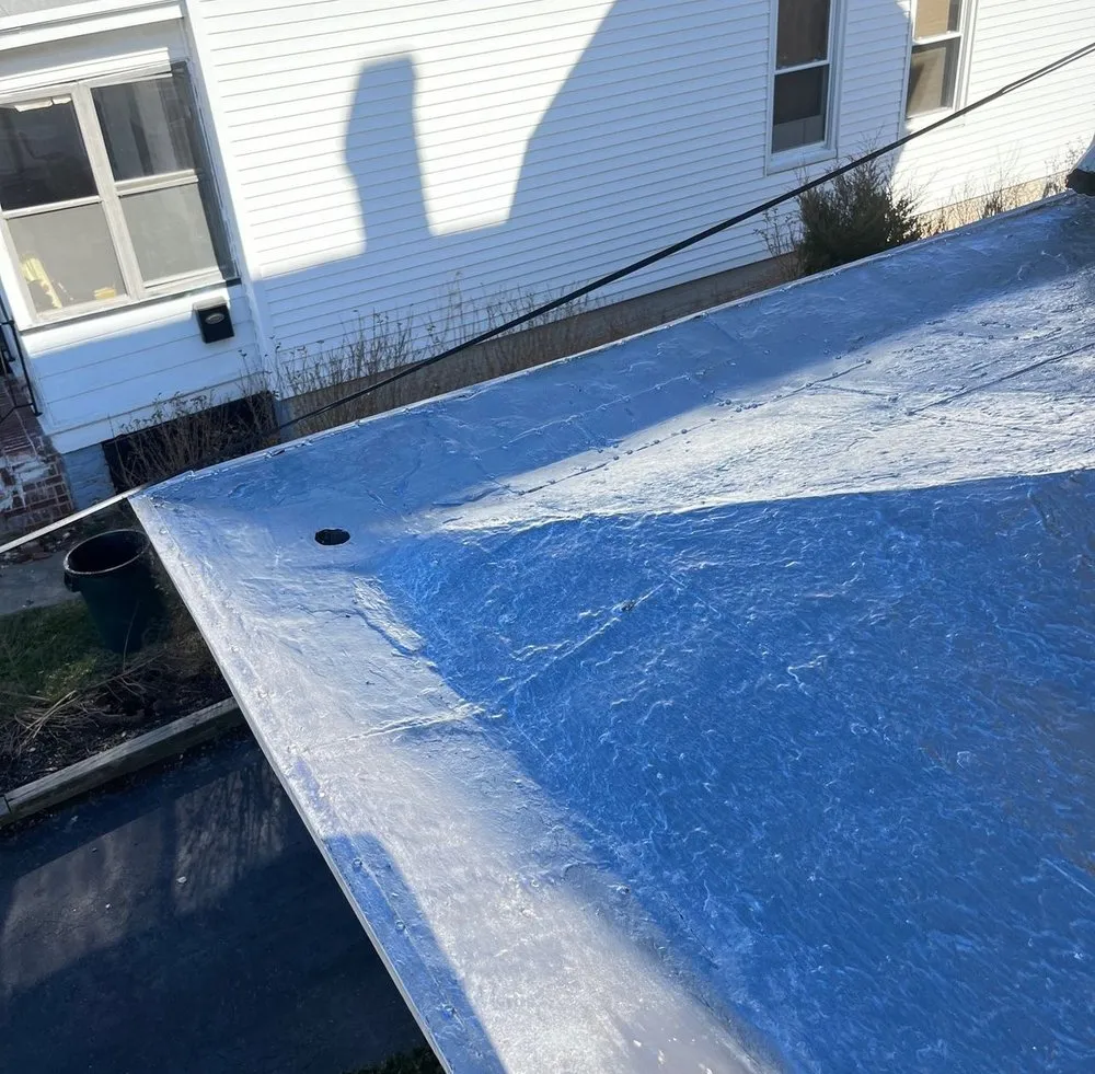 Slide of Asch Roofing