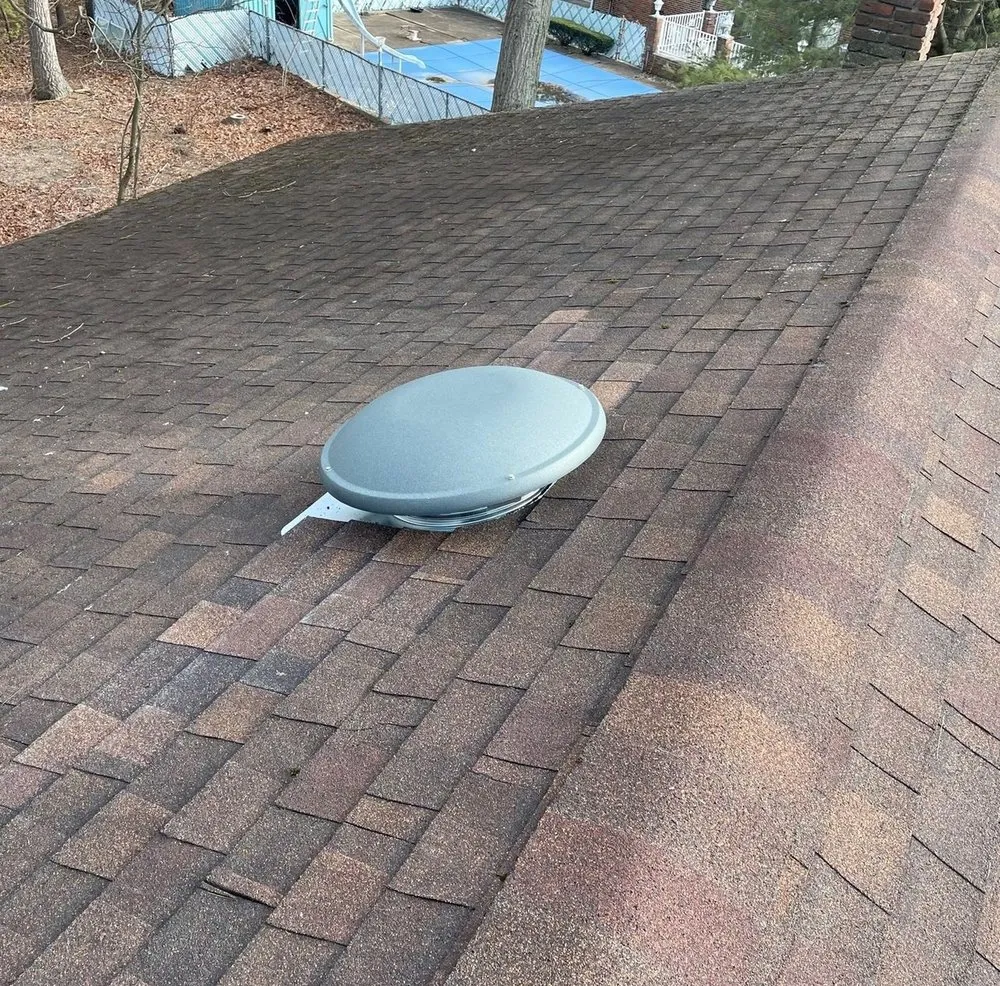 Slide of Asch Roofing