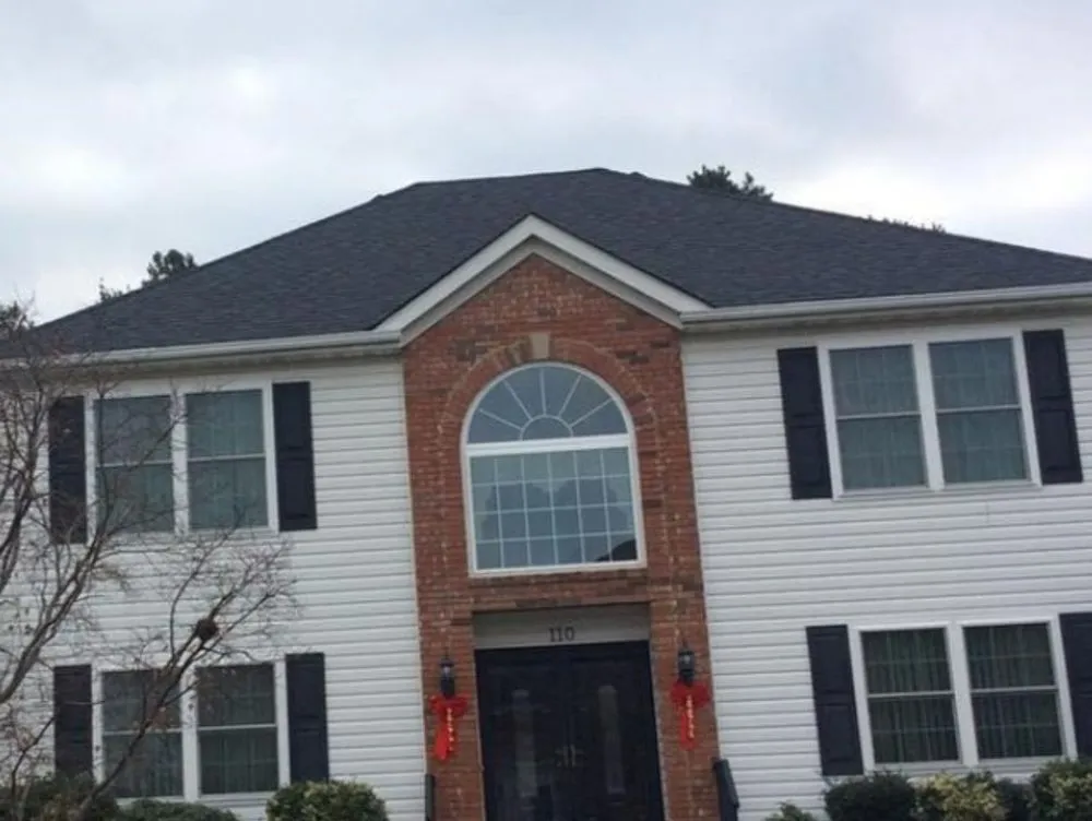 Slide of Asch Roofing