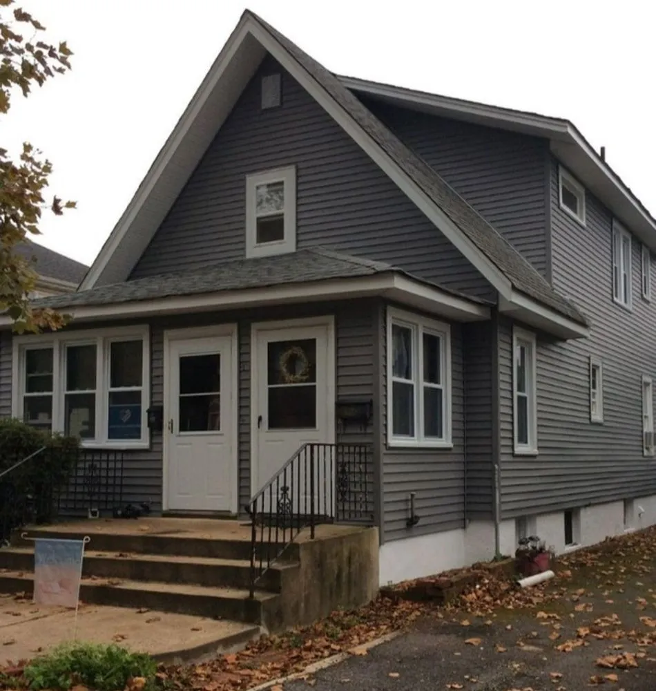 Slide of Asch Roofing