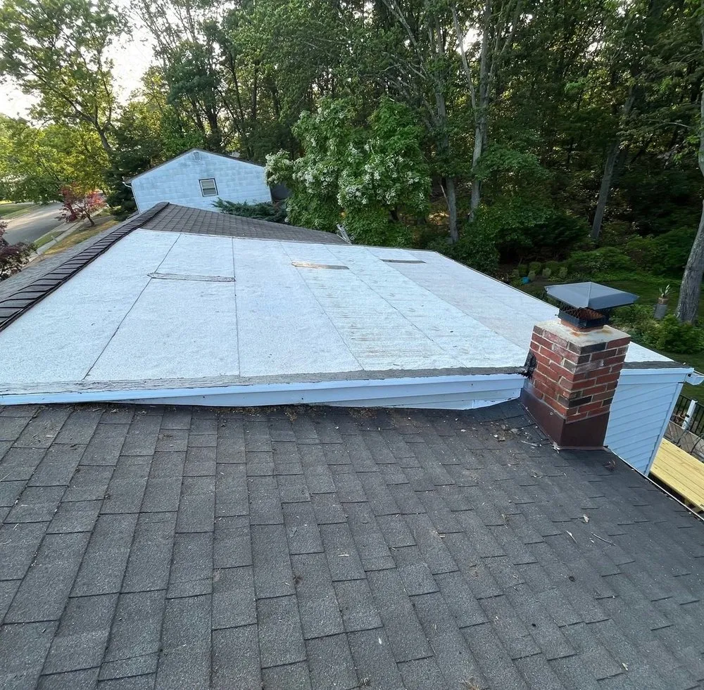 Slide of Asch Roofing