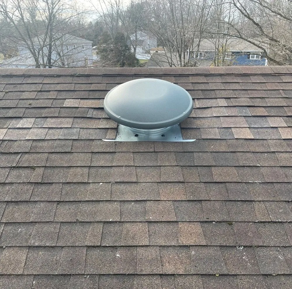 Slide of Asch Roofing