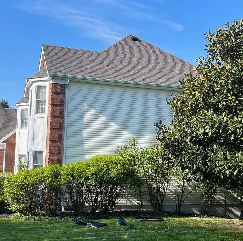 Slide of Asch Roofing