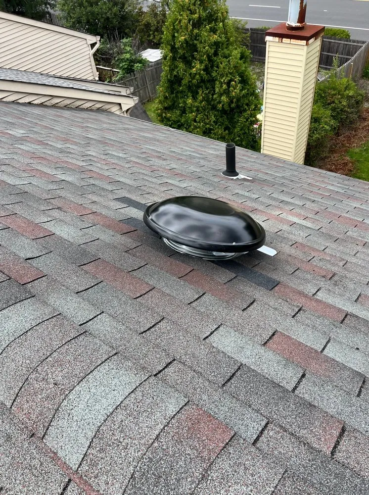 Slide of Asch Roofing