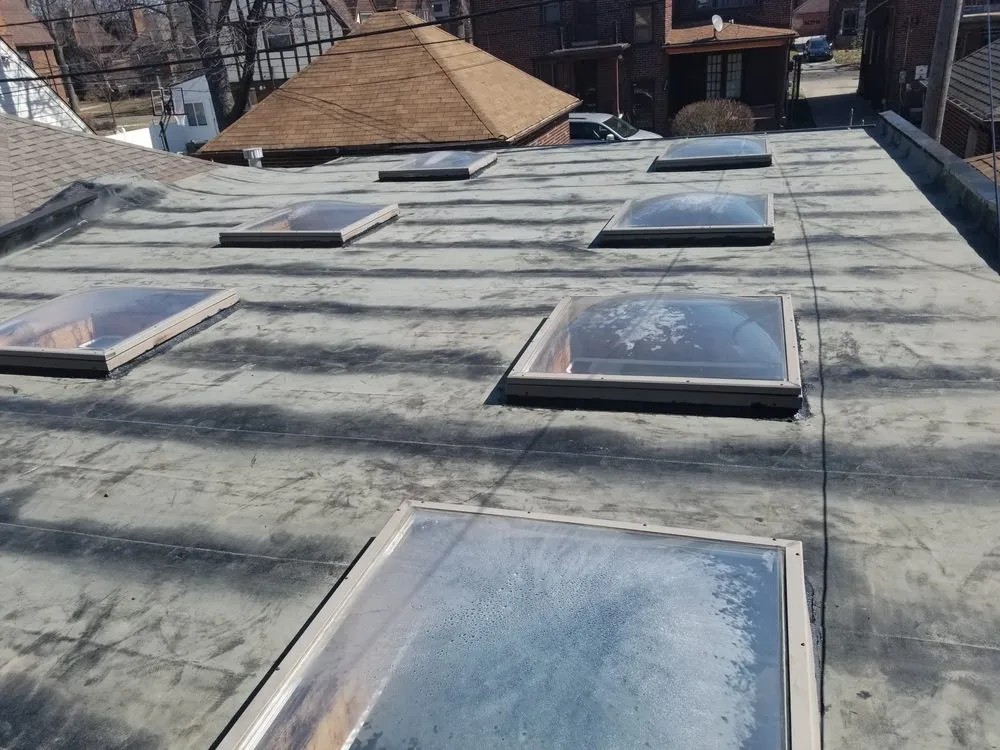 Slide of Ash Roofing