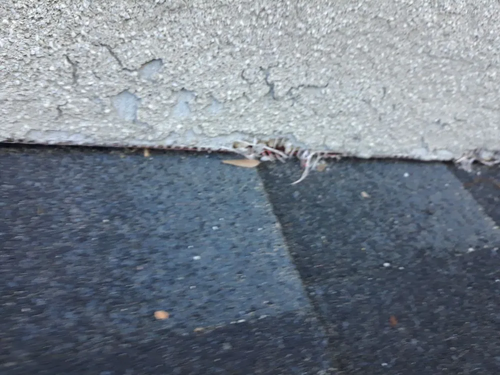 Slide of Ashco Roofing Experts