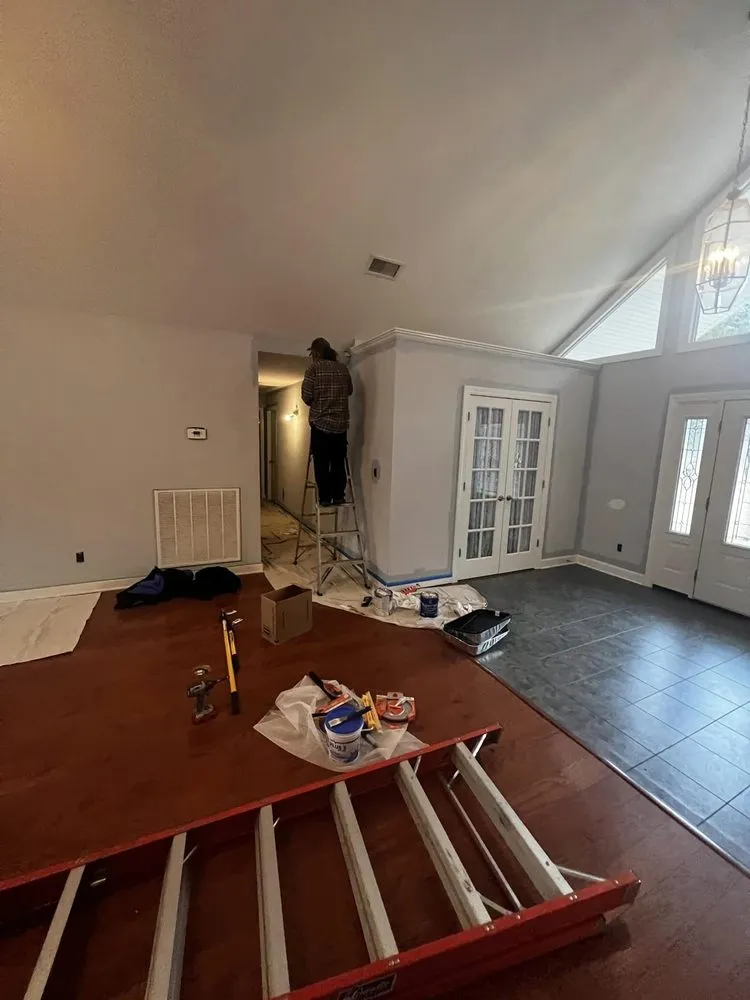 Slide of Asher Handyman and Restoration